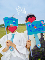 2021 spring new wedding travel props with flags in hand Creative photo studio couple photo props with cards in hand
