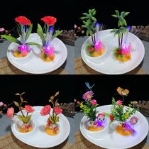Hotel restaurant sasab platter dishes plate decoration flower grass glowing coconut tree peacock lantern embellishment flower
