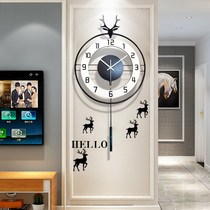 Nordic deer head clock wall clock living room modern simple creative light luxury fashion home clock hanging wall free of holes