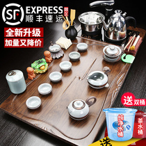 Qin Yikung fu tea suit home living room light extravagant and high-end integrated fully automatic induction cooker solid wood tea tray tea table