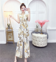 Small foreign flavor 2020 popular summer fashion Yujie net red printing temperament strap Chiffon wide leg one-piece pants for women