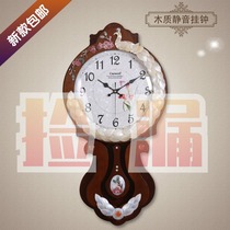 CARAVEL European style solid wood wall clock Korean color shell quartz clock clock living room bedroom silent hanging watch