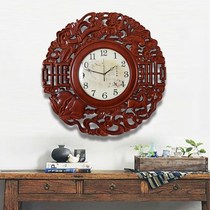 New Chinese style solid wood living room wall clock Dongyang wood carving classical personality round decorative clock Atmospheric watch quartz clock