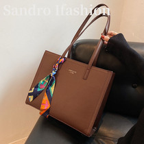 European station large capacity Womens bag 2021 New retro simple shoulder bag Joker tote bag soft leather mobile phone wallet