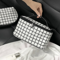 Cosmetic bag female portable 2021 new super fire large capacity cosmetics storage bag 2020 wash bag travel premium