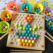 Children's hand eye coordination with ball and bean