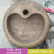 Old stone trough stone grinding plate stone fish farming tank round pot sink outdoor sink courtyard running water landscape
