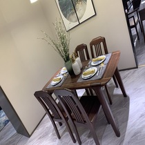The house actually has a table of four chairs.
