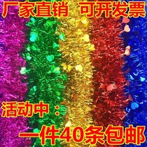 New Years Day decorations colorful madder flower hanging ornaments scene layout green big hairy Christmas tree pendant ribbon