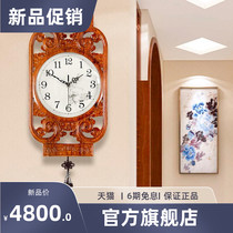 New Chinese solid wood living room hanging bell mute yellow flower pear decoration red wood creative Chinese wind atmospheric quartz clock hanging watch