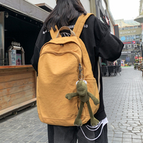 Large capacity canvas schoolbag female Korean version of high school students solid color backpack 16 inch computer backpack mens travel bag