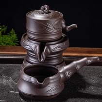 Purple sand stone grinding fully automatic water out of the water teapot kung fu tea set creative single pot tea art lazy stone grinding single accessory