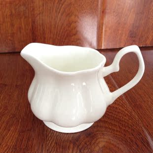 批发奶罐 白色奶壶 陶瓷奶壶纯白骨瓷奶壶 迷你小牛奶壶 小壶子 新品