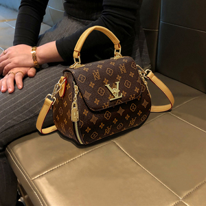 凯狄欧品牌包包女式2024新款高级感时尚锁扣小圆包手提单肩斜挎包