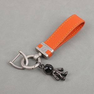 太空人皮革汽车匙钥扣挂件女士锁匙链创意高档公仔马蹄扣网红挂饰