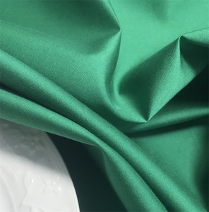 深绿色系烫衬涤天丝棉面料 无弹挺括支棱垂 外贸工厂布头G307