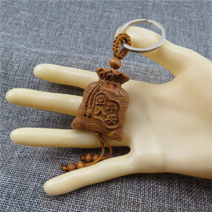 创意个性钥匙扣立体雕刻桃木木质小工艺品福袋貔貅钱袋子汽车锁扣