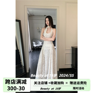 白色微透提花连衣裙女夏季美式辣妹无袖高级感度假风挂脖碎花裙子