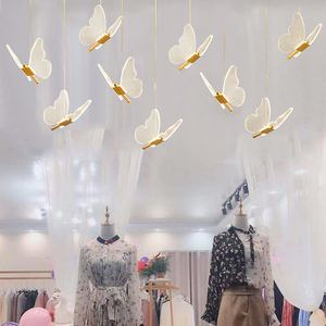 服装店橱窗吊灯装饰收银台简约个性女装店铺商用创意吧台蝴蝶灯具