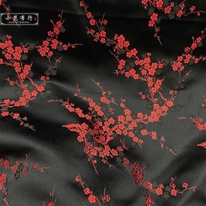 黑底红色腊梅花织锦缎布料 聚酯纤维服装面料 民族风唐装旗袍汉服