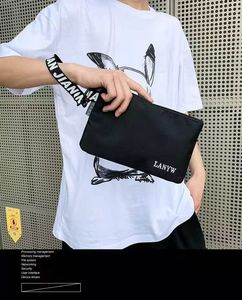 新款韩版潮牌男女通用手拿信封包手机零钱包外出便携大容量手拎包