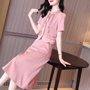 2024年春夏季新款新中式国风流苏盘扣上衣半身裙粉色两件套连衣裙
