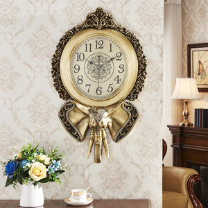 大象欧式挂钟家用美式静音钟表创意客厅石英钟黄铜色装饰丽声机芯
