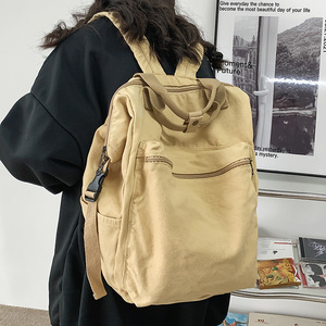 大容量帆布双肩包学生背包时尚韩版男女书包流行新款纯色韩版包包
