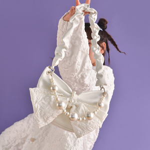 原创蝴蝶结甜酷包包女设计感小众 高级感珍珠斜挎法式白色腋下包