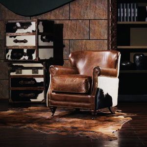 美式复古老虎椅黑白奶牛皮单人沙发椅真皮做旧咖啡馆威士忌雪茄吧