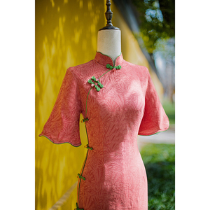 橘红色旗袍新款2024女夏季新中式改良年轻款少女连衣裙提花中长款