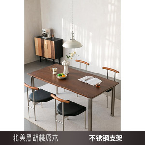 北欧黑胡桃木餐桌家用小户型简约书桌不锈钢脚书桌现代轻奢实木桌