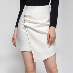 2021新款白色高腰显瘦钉珠扣装饰A字不规则半身裙短裙女 厂家