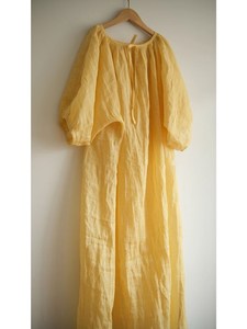2024年夏季设计感小众苎麻奶系穿搭黄色森女风温柔系法式连衣裙子
