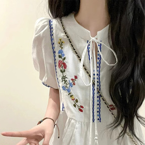 白色刺绣泡泡短袖连衣裙女2024夏季民族度假风设计感气质公主长裙