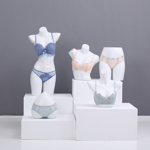 内人衣店模特文胸内裤展示男女半身橱窗道具架聚拢大胸假体模型。