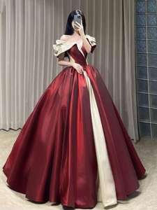 新款一字肩红色晚礼服2023优雅显瘦大摆舞台演出新娘坐床晚宴公主