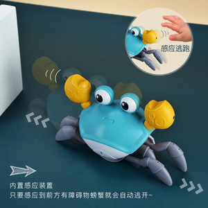 儿童电动螃蟹自动感应避障发光音乐逃跑螃蟹玩具USB充电跨境爆款