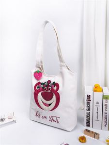 新款草莓熊帆布包女春夏卡通可爱软萌单肩包学生书袋挂件手拎袋