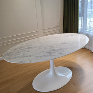 北欧简约白色天然大理石餐桌宝格丽岩板椭圆形家用郁金香桌子高端