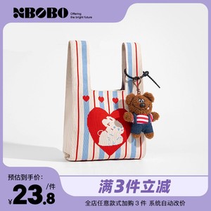 XBOBO小白兔奶糖针织手拿包可爱大容量手拎包出行便携手提包礼物