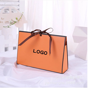 橙色购物袋个性三角形手提包式包装袋ins创意T恤衣服礼品包装纸盒
