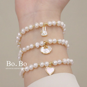 天然淡水珍珠设计贝壳蝴蝶手链新中式平安锁爱心手串弹力绳手饰品