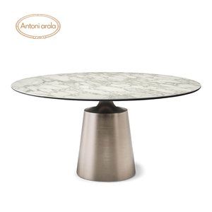 北欧设计师轻奢岩板圆形餐桌不锈钢餐台吃饭桌家用6-10人现代简约