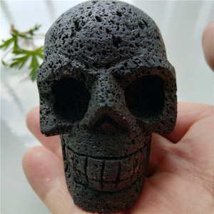 收藏版天然黑火山灰骷髅头摆件水晶岩浆人头骨把玩手把件矿物原石