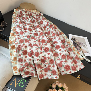 橘红玫瑰花碎花半身裙女夏季2024新款印花棉布遮跨显瘦A字伞裙子