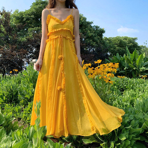 巴厘岛沙滩裙超仙海边度假2020新款黄色吊带气质海滩长裙连衣裙女