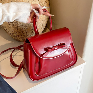 红色蝴蝶结小包包女2024夏季新款手提小方包设计感个性背包斜挎包