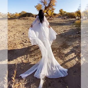 白色沙滩裙女飘逸沙漠青海旅游拍照长裙子海边度假拖地异域连衣裙
