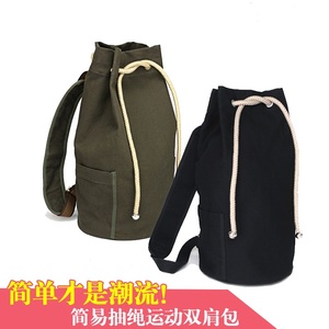 促销正品韩版抽绳男士双肩背包篮球包帆布水桶包户外休闲运动背包